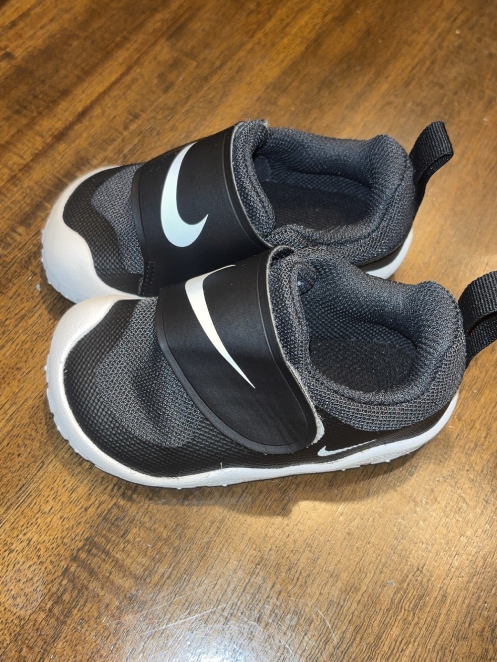 Nike Kids Black and White Slip-On Athletic Sneakers